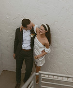 Couple posing on their wedding day